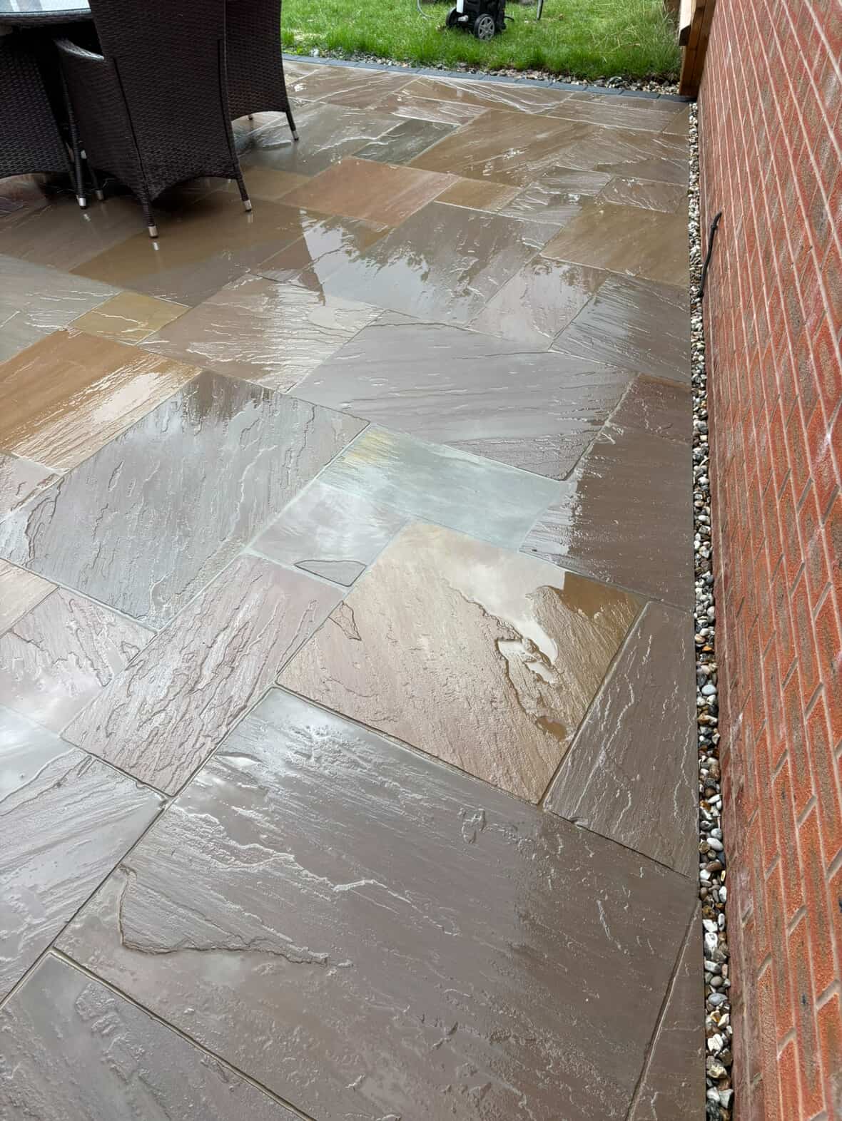 Indian sandstone patio with garden furniture in Derby