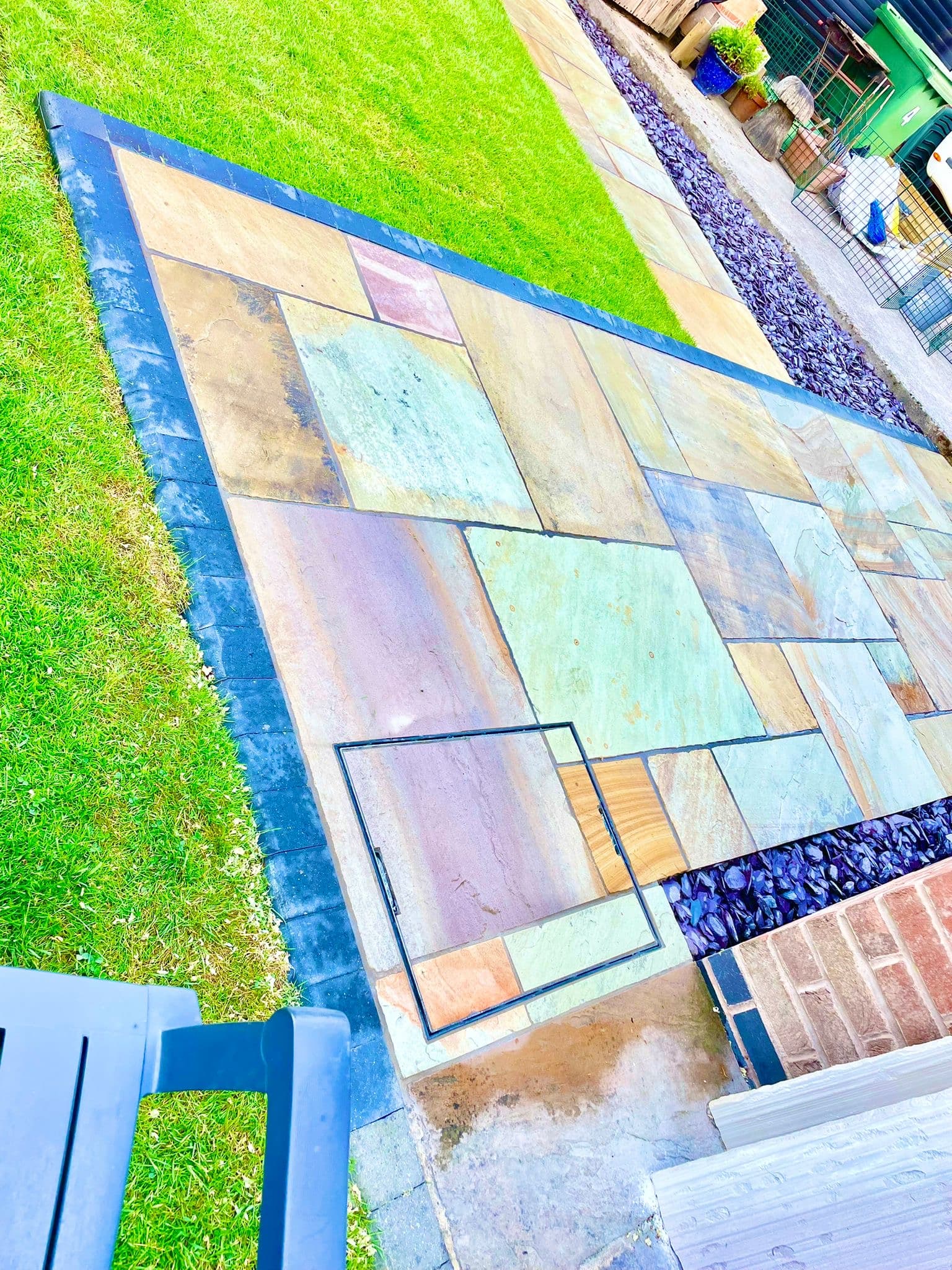 Increased lawn area created by reducing the patio footprint