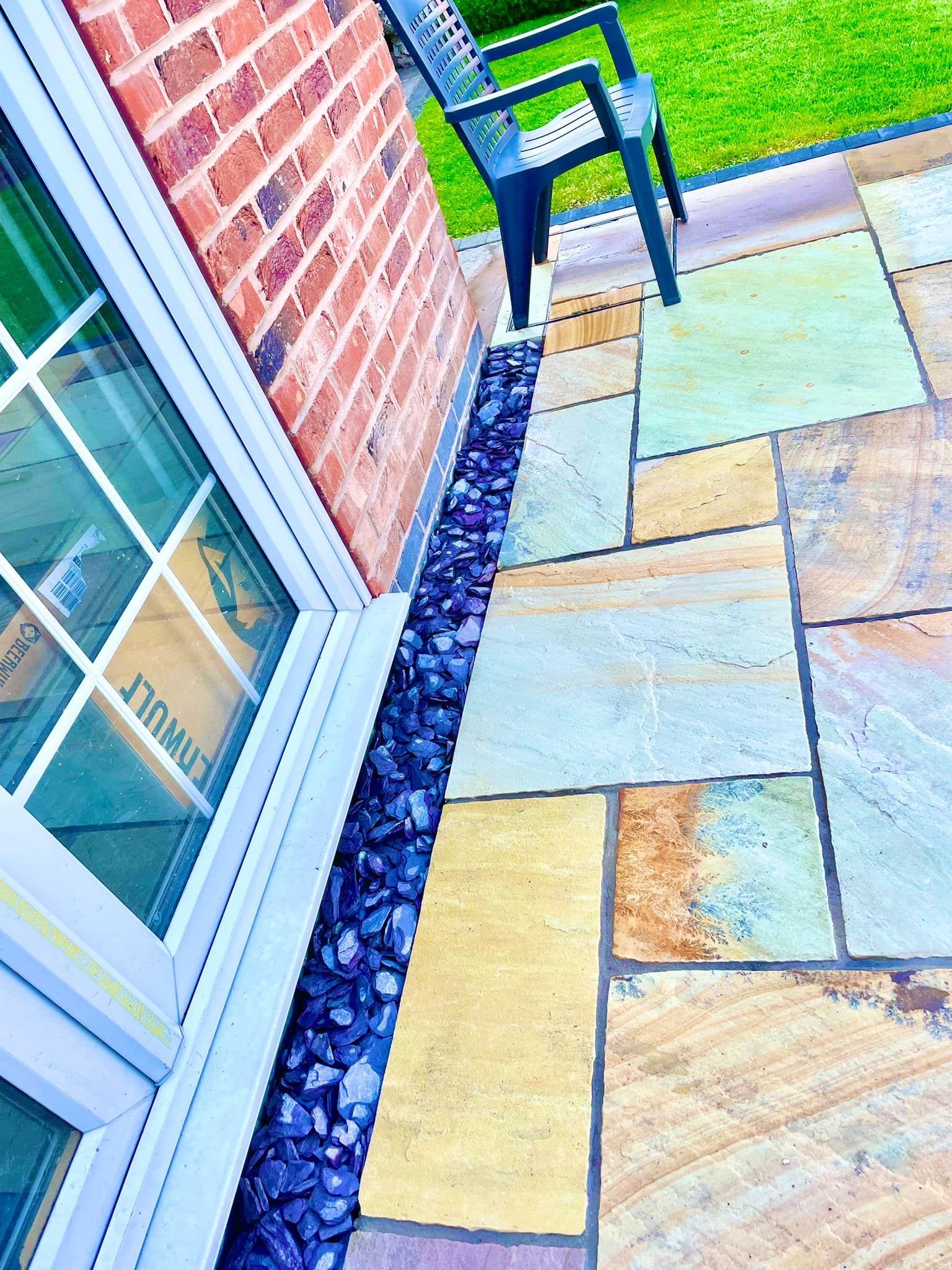 Completed patio and path installation in Derby viewed from the house